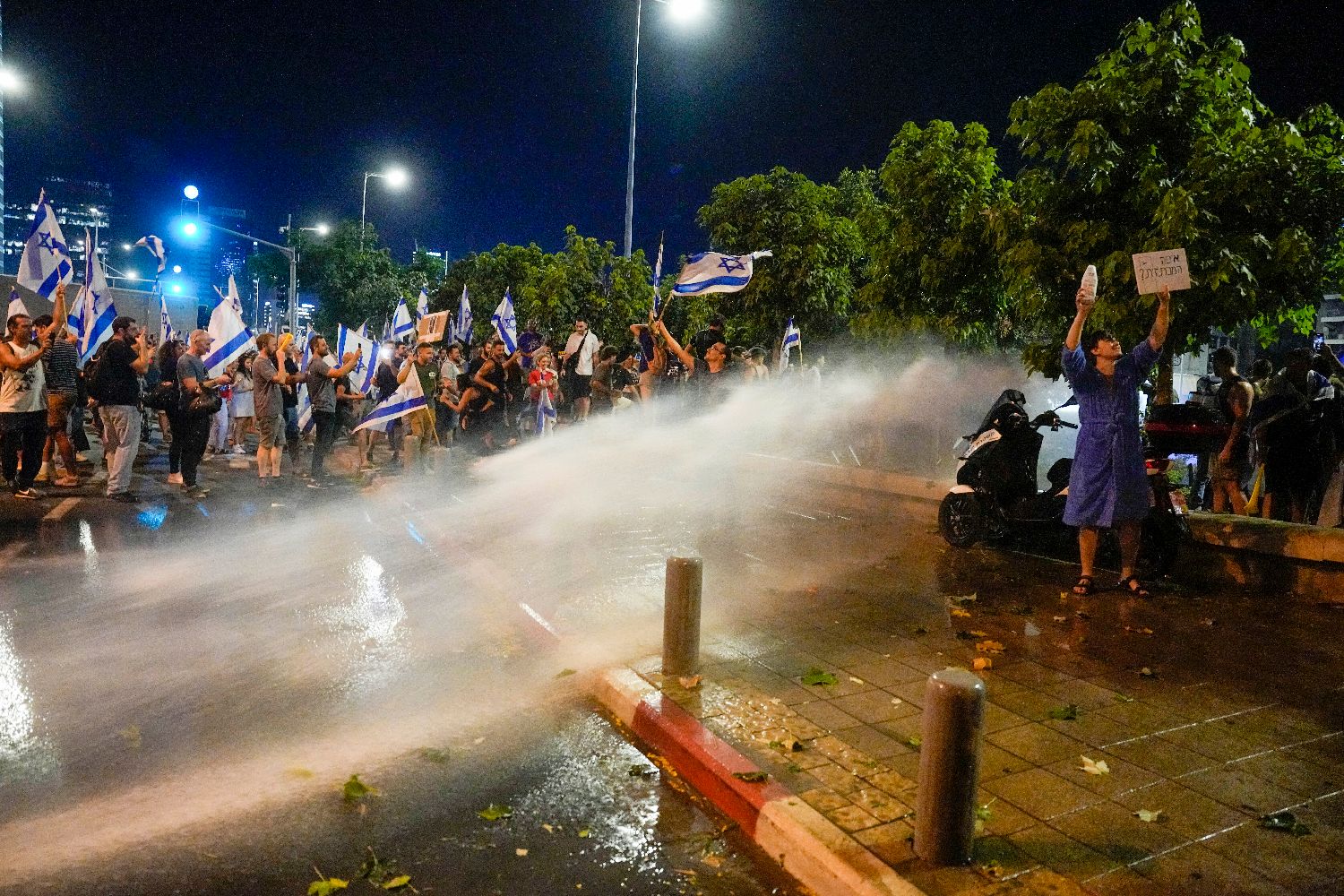 Physicians urge police to suspend water cannon use after protesters ...